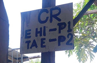Bathroom sign in Philippines language